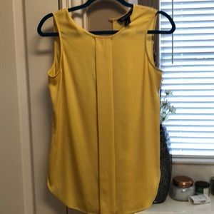 Yellow sleeveless blouse